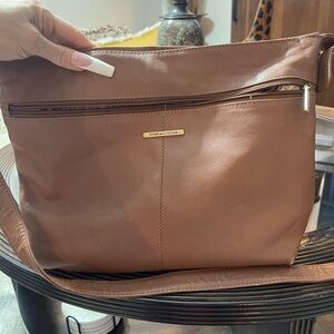 Stone Mountain Chestnuts Brown leather Crossbody Bag with Metallic Hardware​​